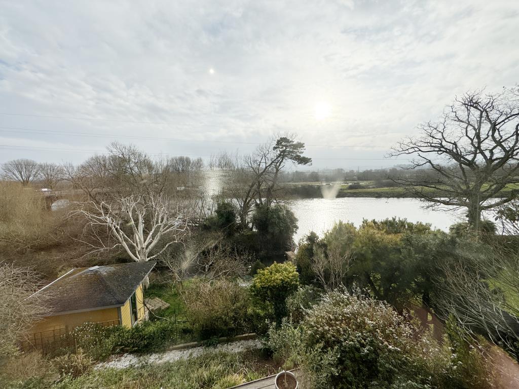 Lot: 76 - ONE-BEDROOM APARTMENT WITH RIVER VIEWS - View from the living room & dining room